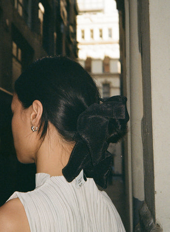 Twisted Knot Hoops
